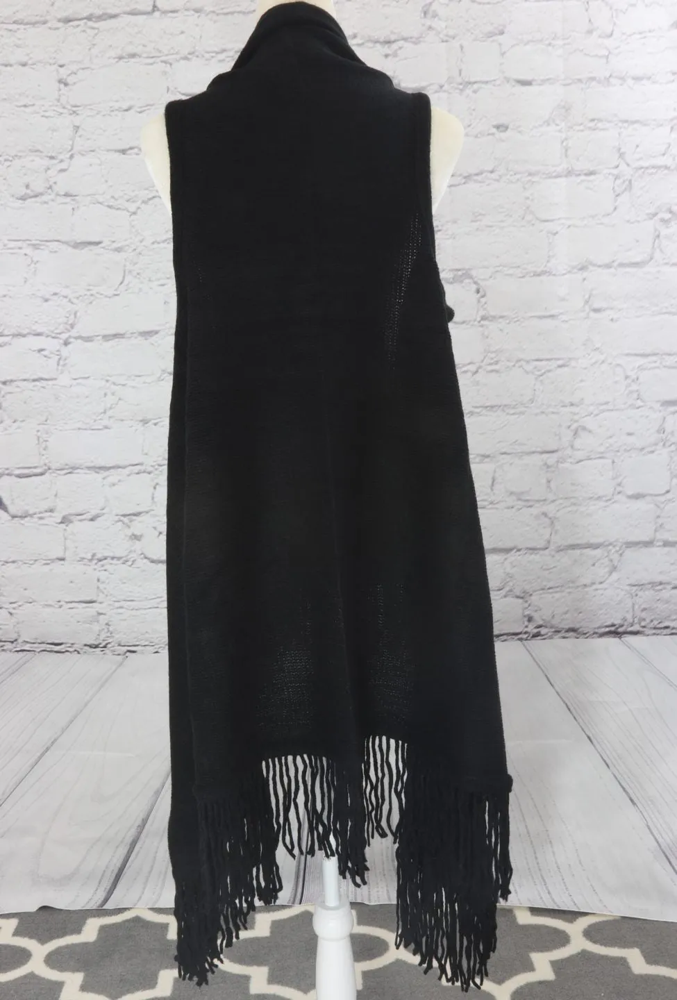 Solid fringe knit vest