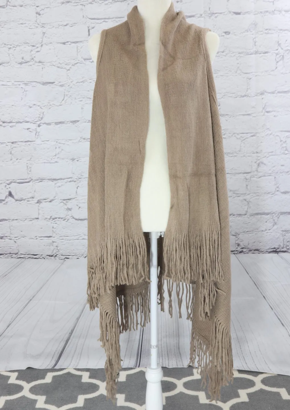 Solid fringe knit vest